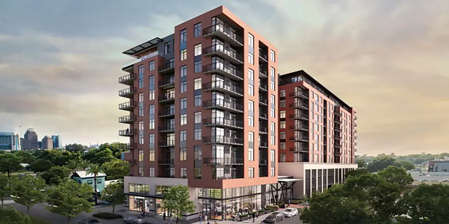 Modern apartment building with retail space.